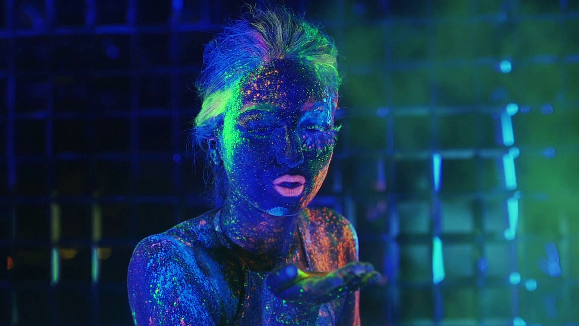 Girl In Ultraviolet Light Blows Green Stock Footage SBV-308437523 ...