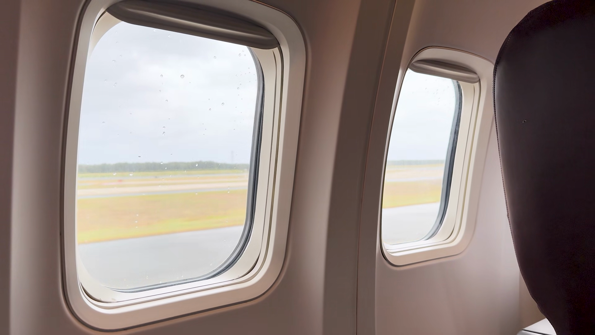 View From Airplane Window Of Rainy Airport Stock Footage SBV-354411443 ...