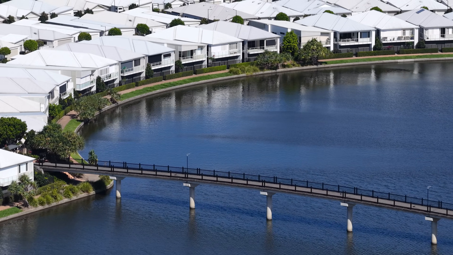 Aerial View Of Lakefront Houses Pedestrian Stock Footage SBV-353606991 ...