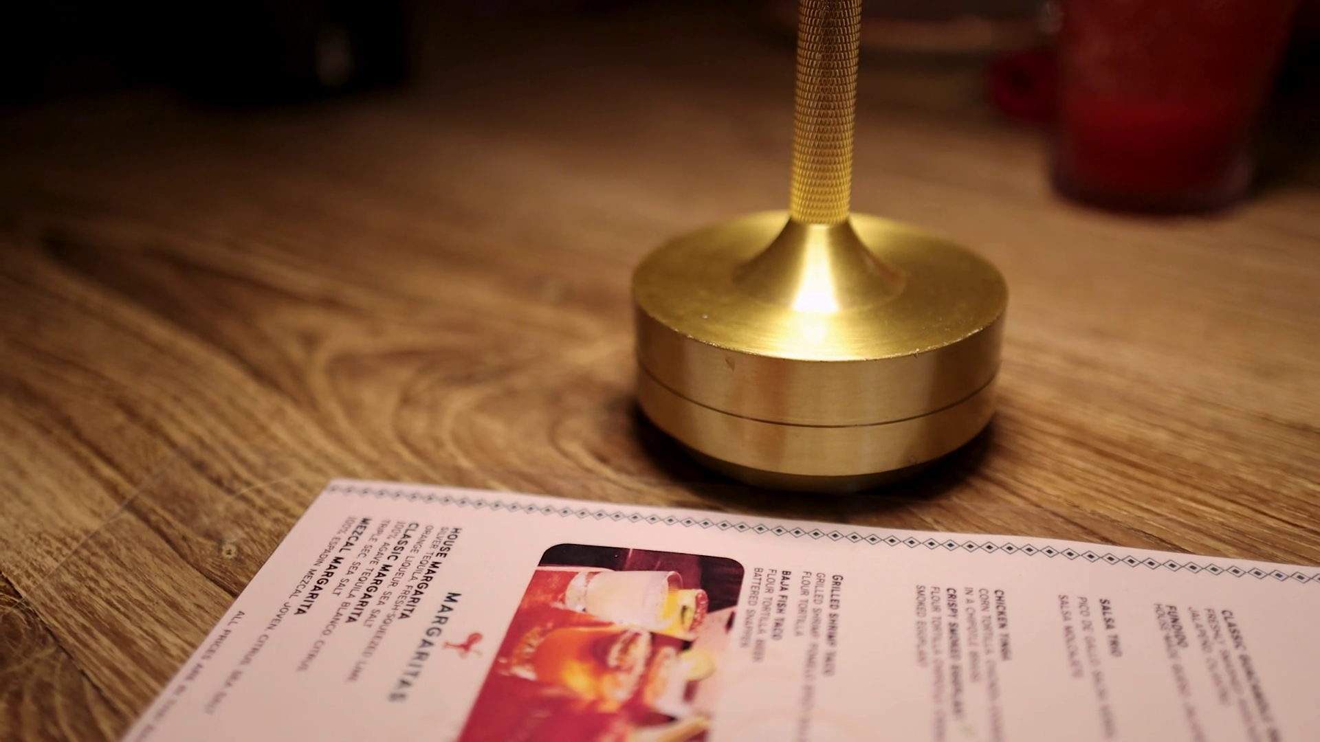 Warm Tabletop Scene With Gold Lamp Menu In Stock Footage SBV-352541265 ...