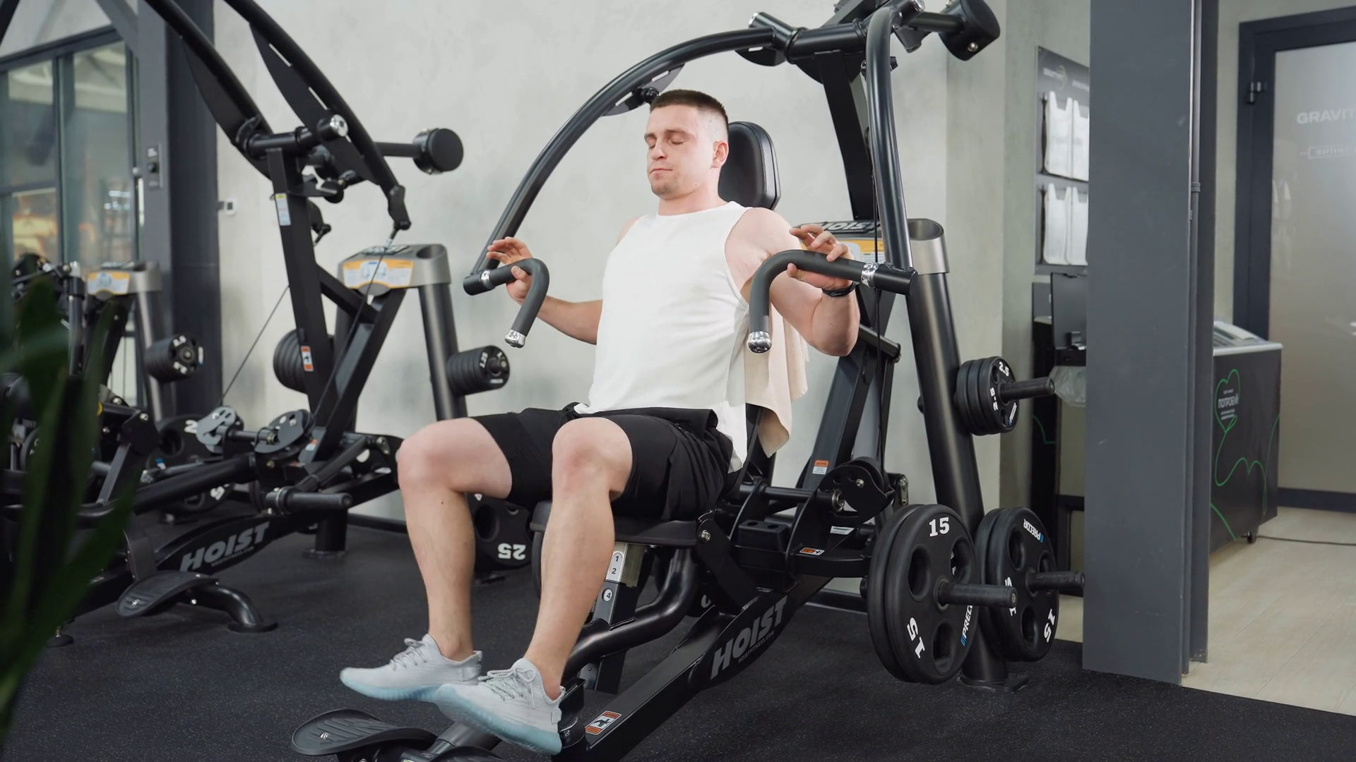Gym Goer Seated On Weight Machine Balancing Stock Footage SBV-352084251 ...