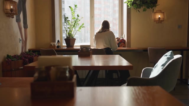 Sitting At Tables Stock Footage: Royalty-Free Video Clips - Storyblocks