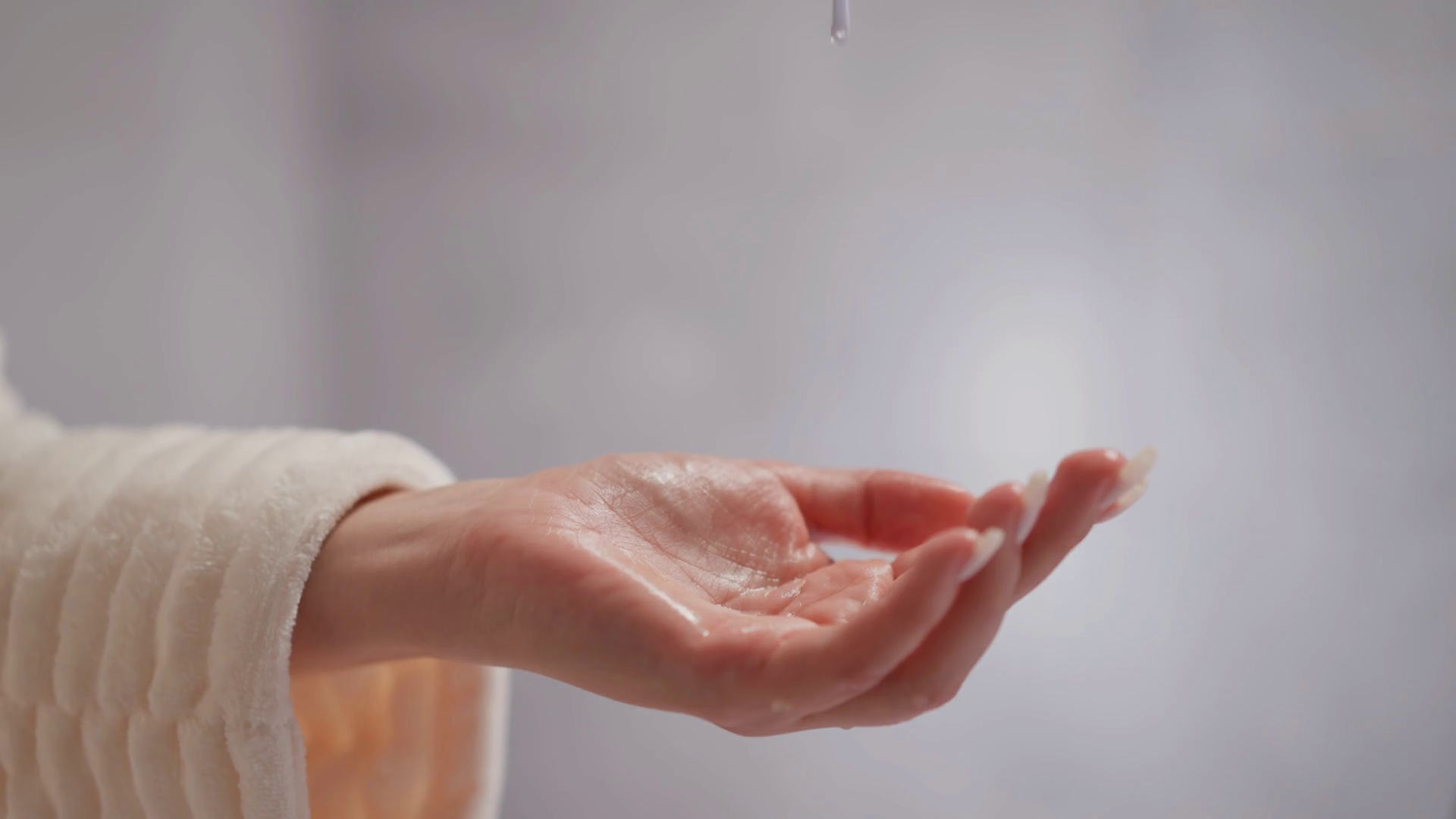 Female Pours Liquid Product Into Hand To Stock Footage SBV-348566492 ...