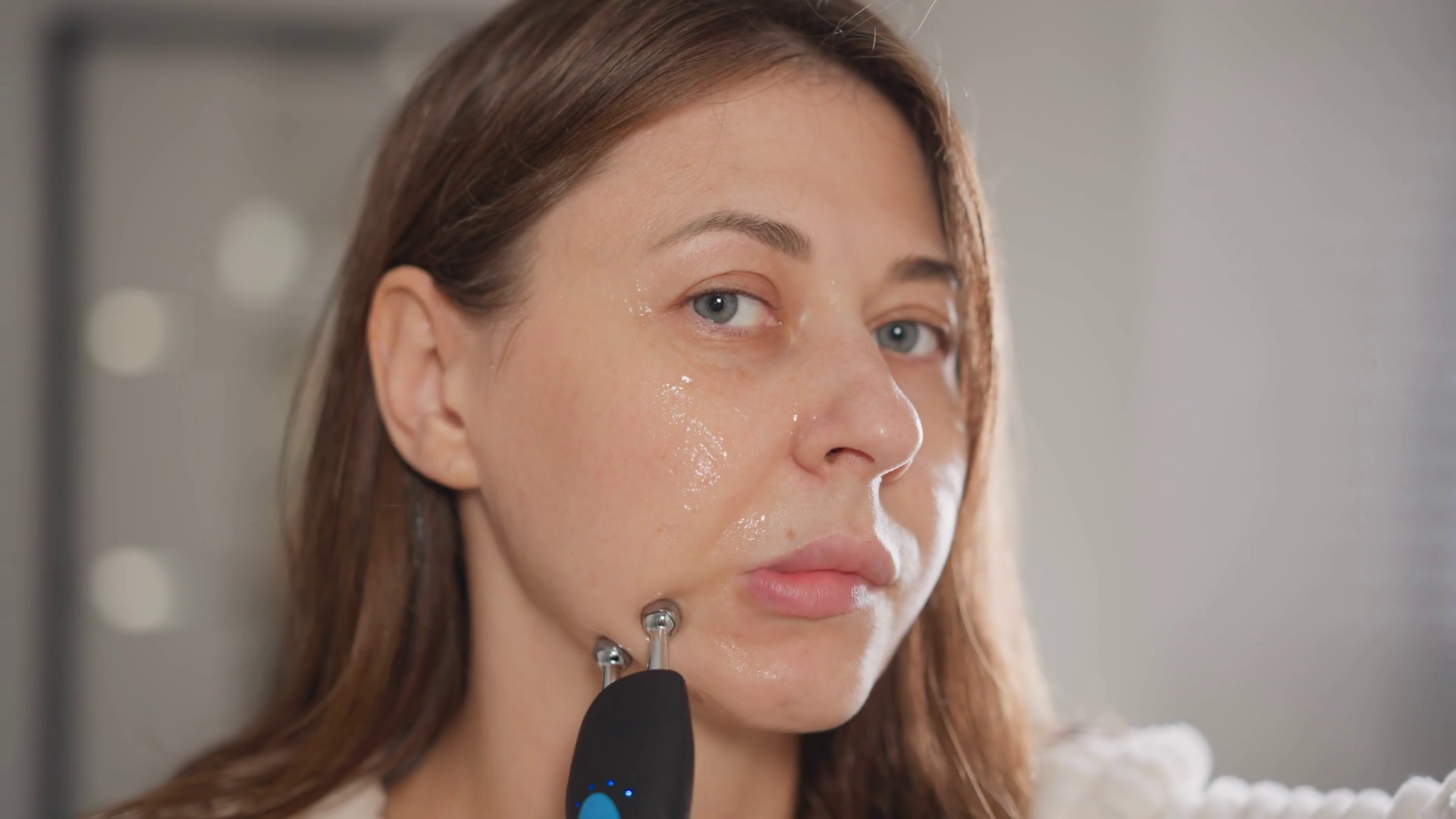 Woman Does Microcurrent Procedure To Facial Stock Footage SBV-348566935 ...