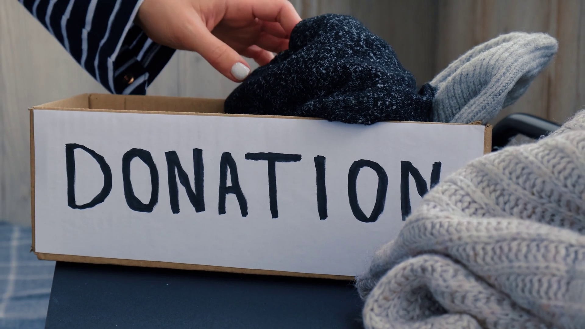 Female Volunteer Making Donation Box With Stock Footage SBV-348414120 ...