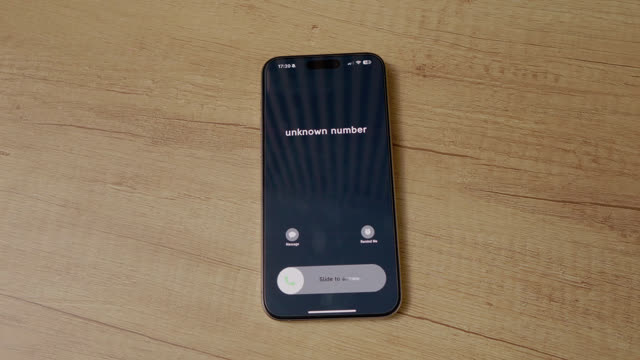 Cell Phone Ringing On Table Stock Footage: Royalty-Free Video Clips ...