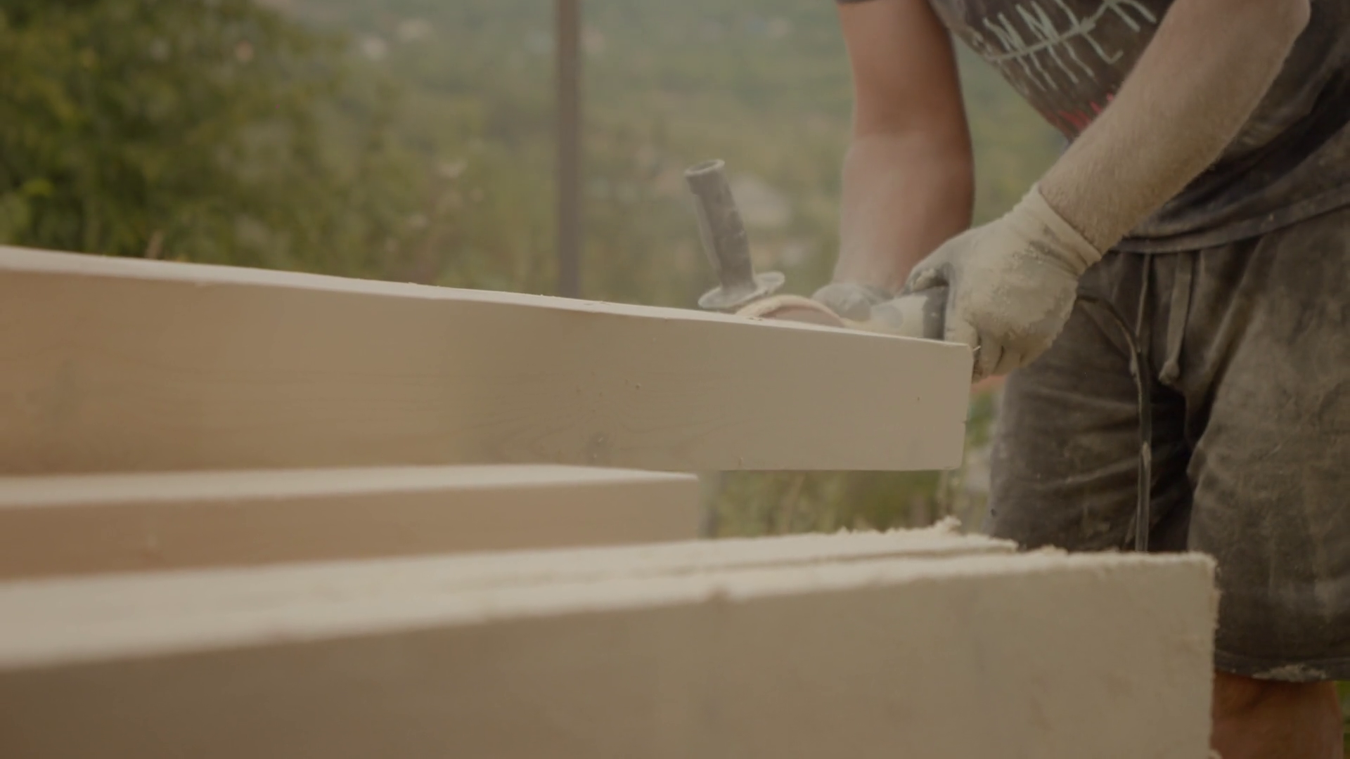 A Worker Skillfully Sands Wooden Beams Using Stock Footage SBV ...