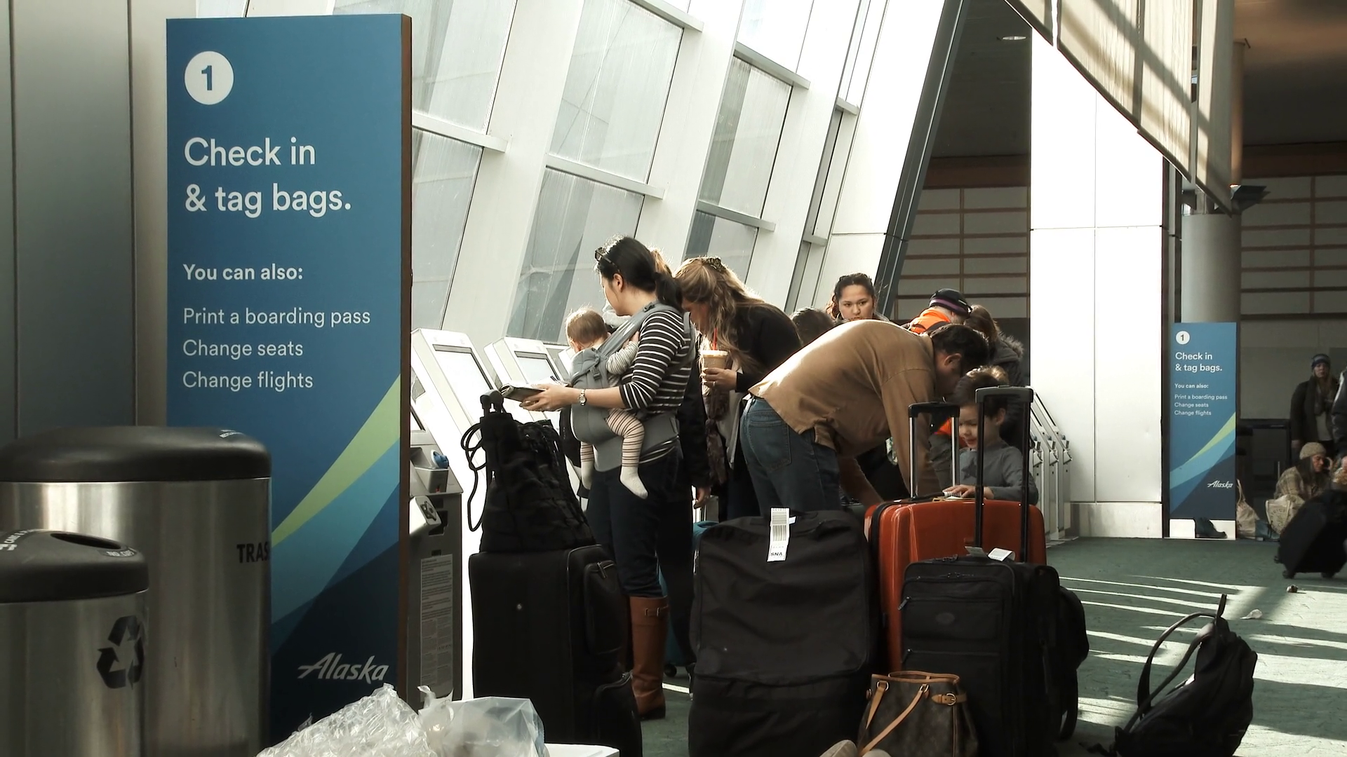Family Checking In At Airport Stock Footage SBV-330845410 - Storyblocks
