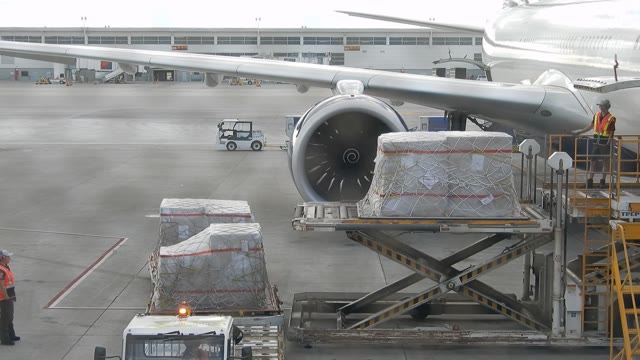 Airplane Cargo Loading Unloading Stock Footage: Royalty-Free Video ...