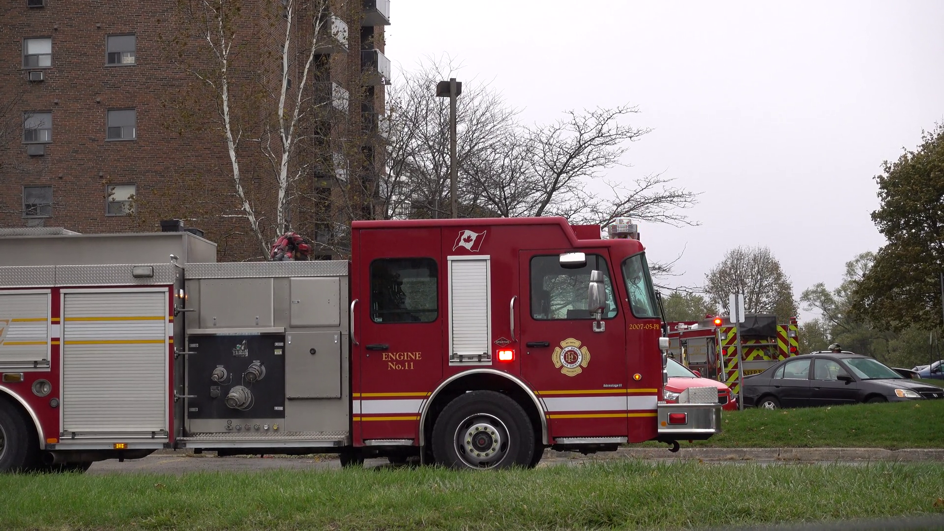 The Front Of Red Fire Truck With Fireman Stock Footage SBV-347788575 ...