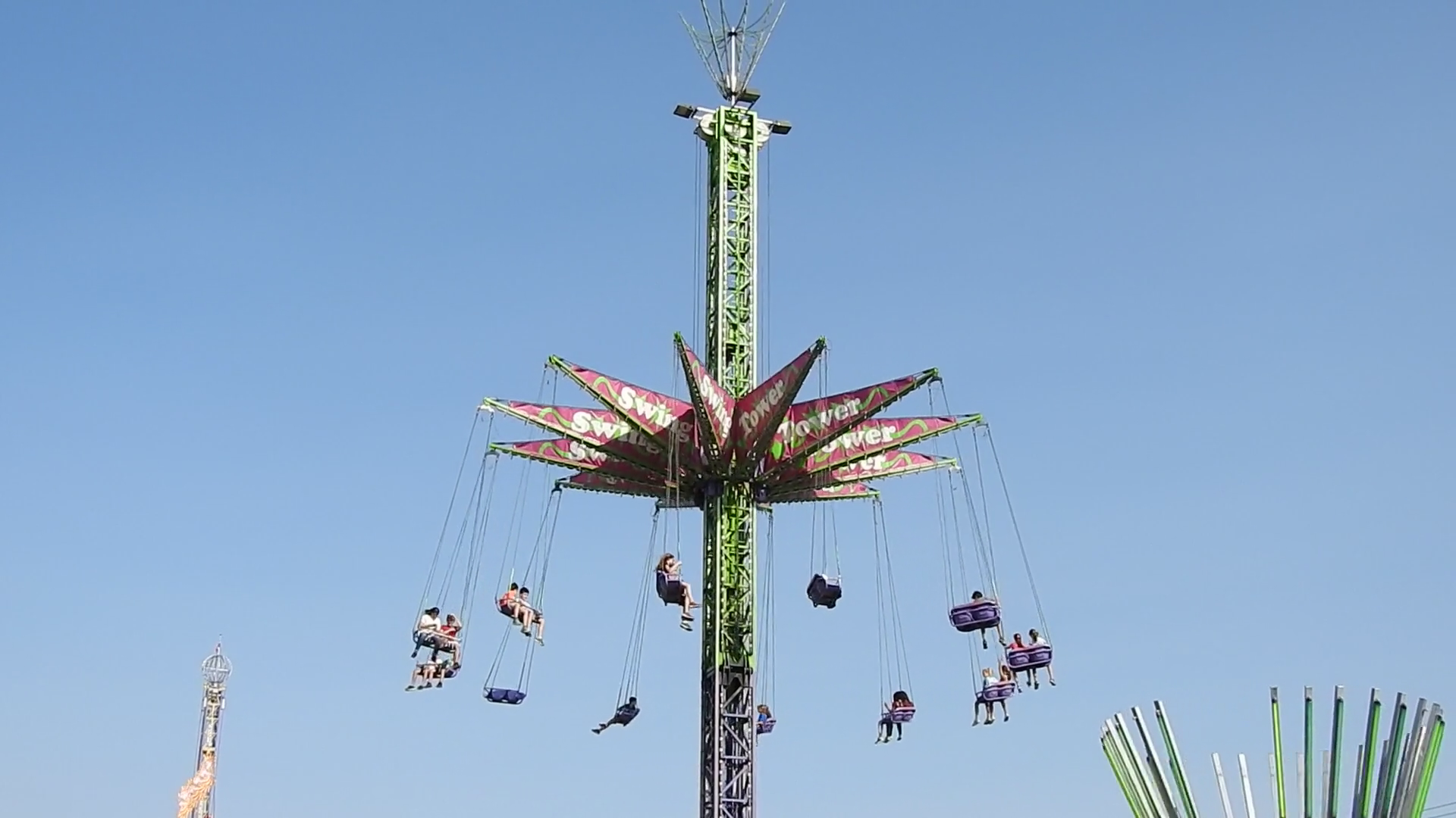 The Swing Tower Ride At Fair Amusement Park Stock Footage SBV-347747143 ...