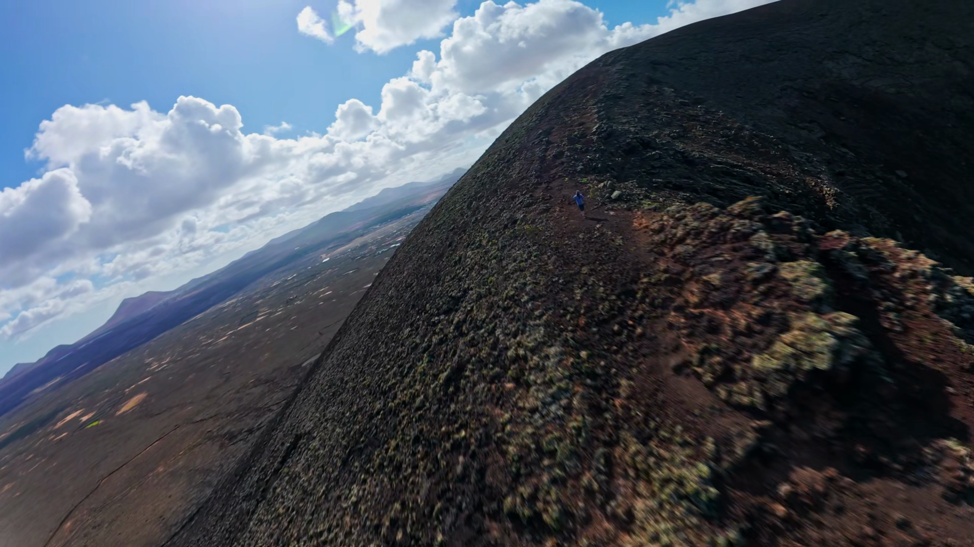 Aerial Drone Sweep Traces Volcanic Ridgeline Stock Footage SBV ...