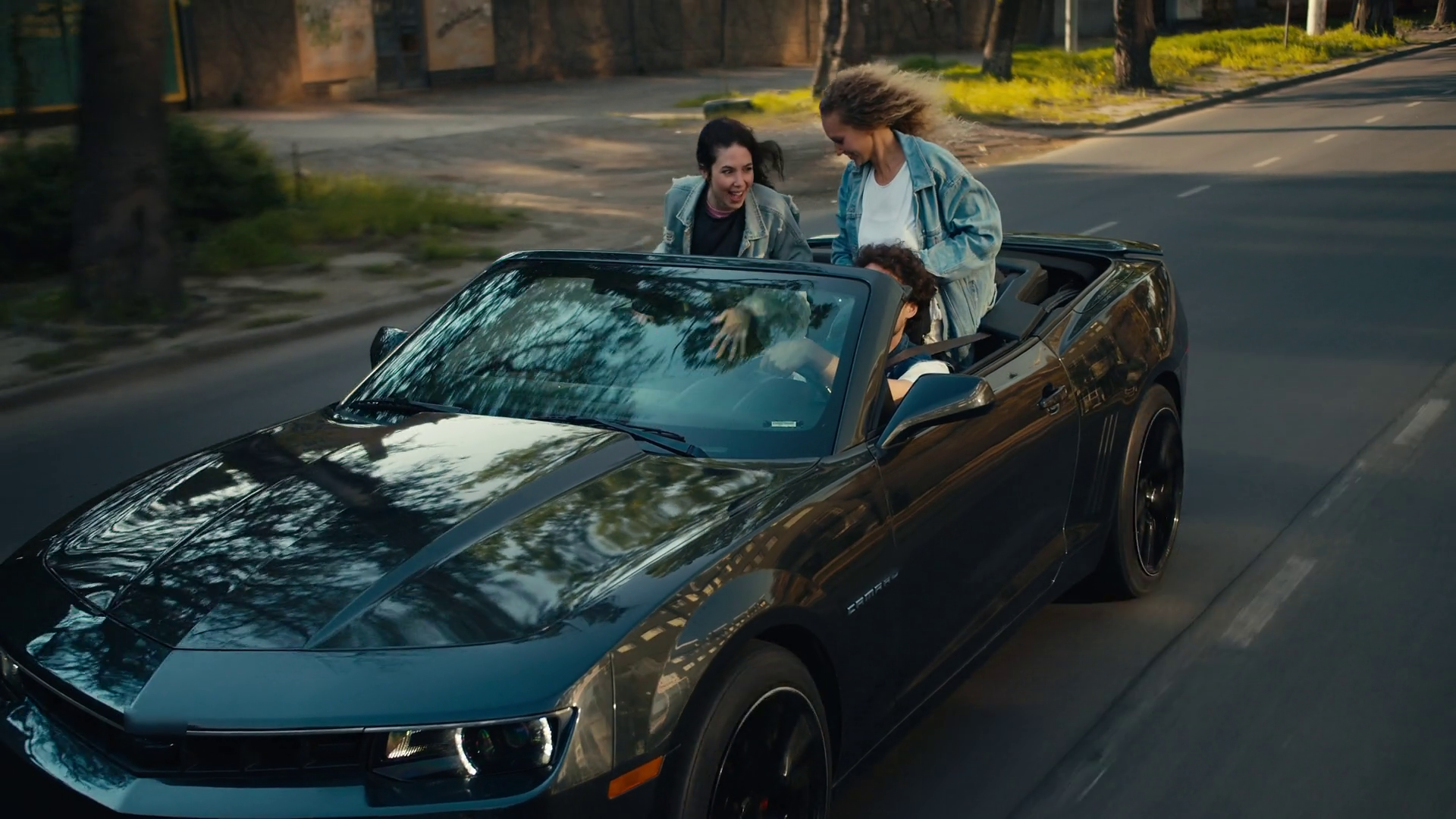 Friends Enjoy Joyful Ride In Convertible Stock Footage SBV-347791459 ...