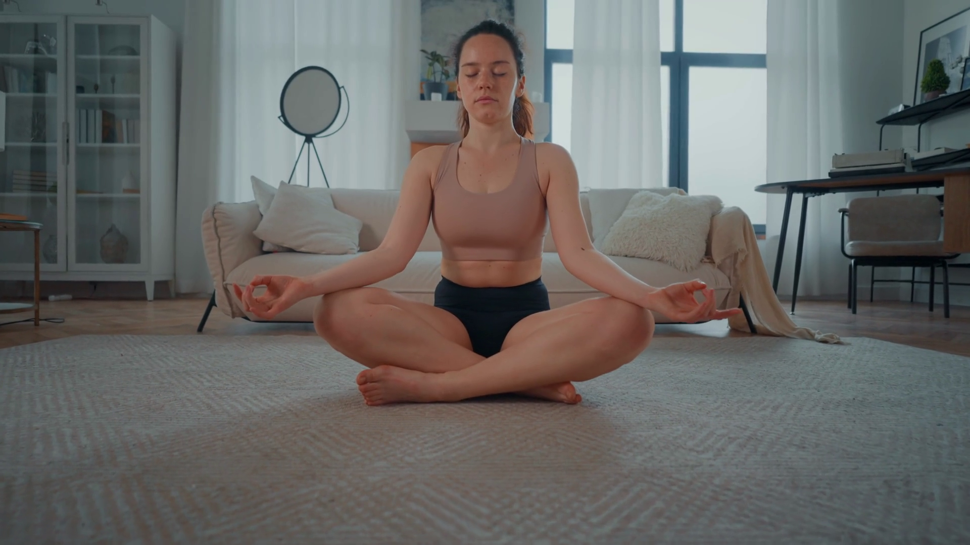 A Woman Is Seen Sitting In Yoga Position In Stock Footage SBV-348868066 ...