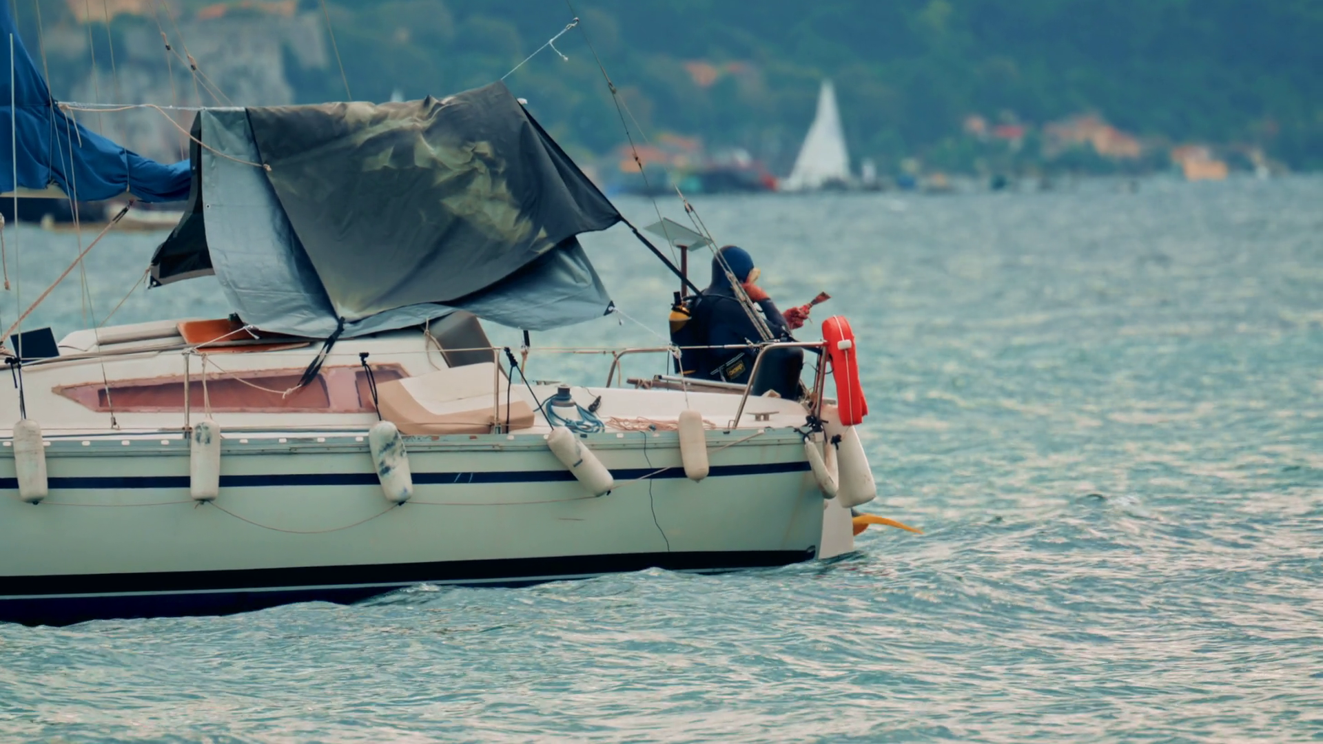 View Of Small Sailboat Rocking On Waves With Stock Footage SBV ...