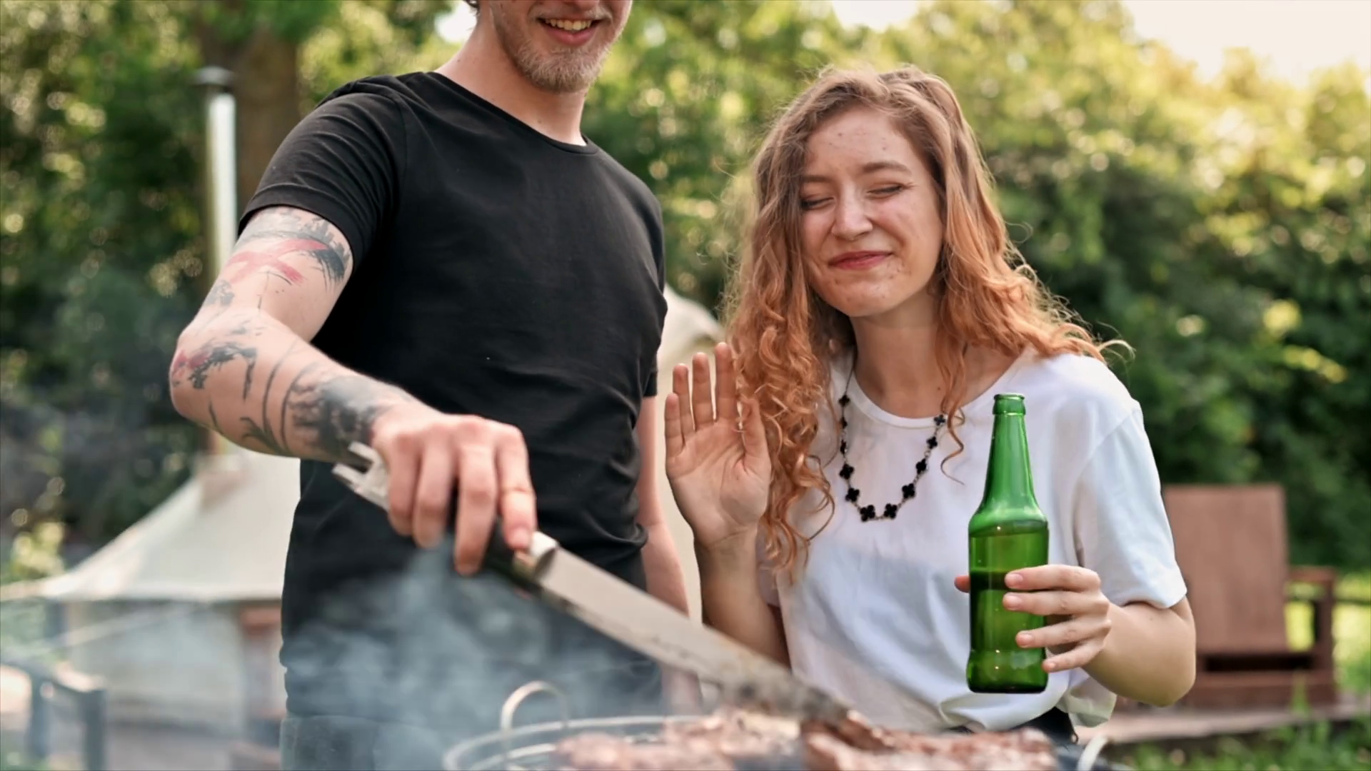 Young Couple Frying Meat On Grill Drinking Stock Footage SBV-352493876 ...