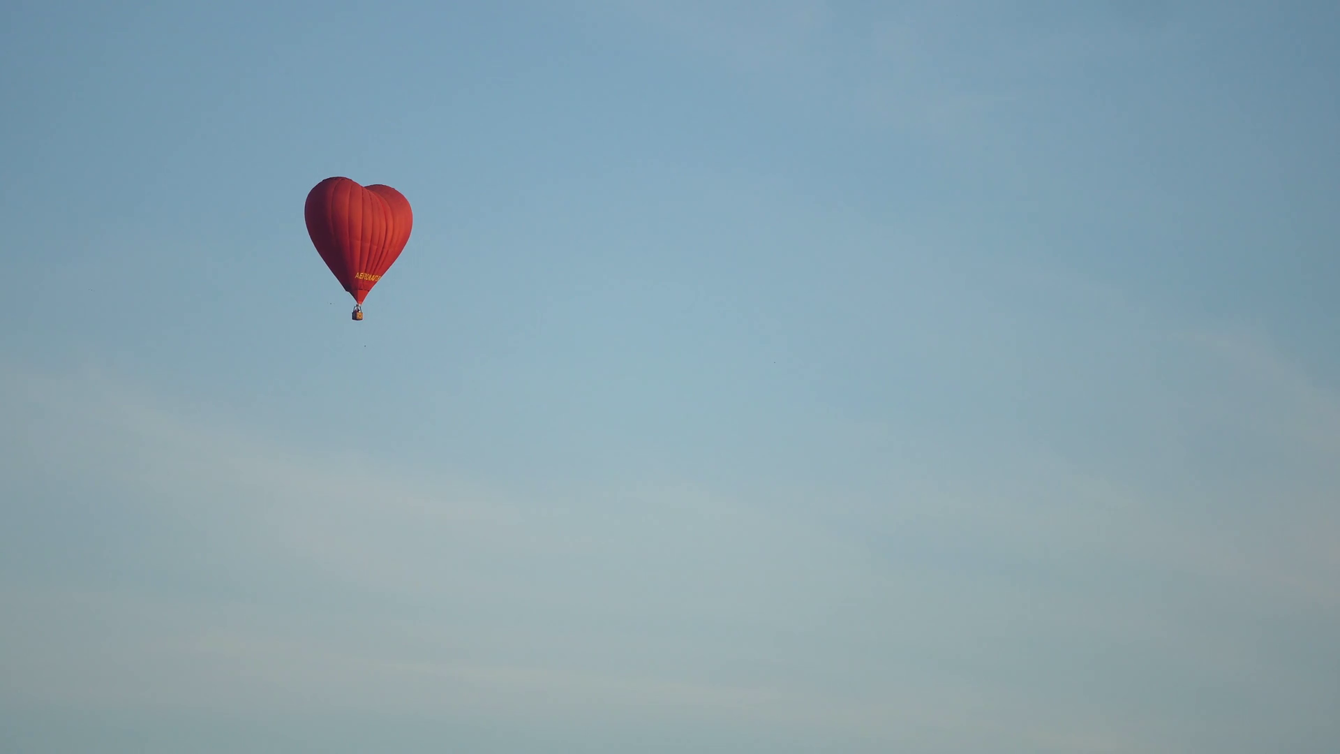 Hot Air Balloon Shape Of Heart In Blue Sky Stock Footage SBV-348495794 ...