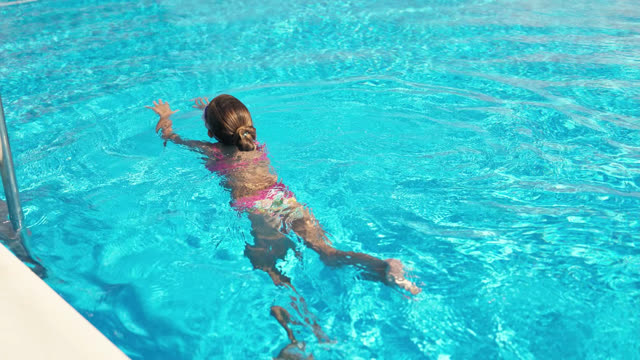 Child Girl Swimsuit Stock Footage: Royalty-Free Video Clips - Storyblocks