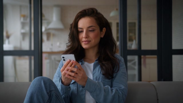 Woman Watching Video Stock Footage: Royalty-Free Video Clips - Storyblocks