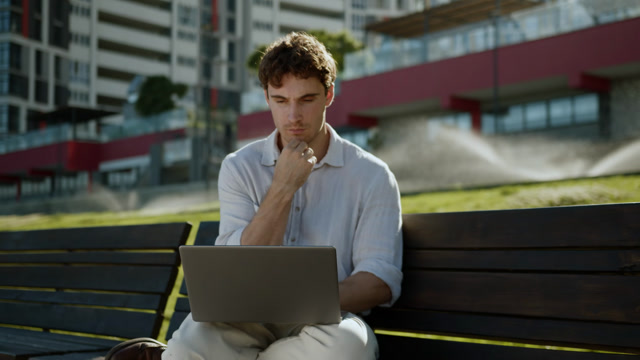 Sit Hunched Over A Laptop Stock Footage: Royalty-Free Video Clips ...