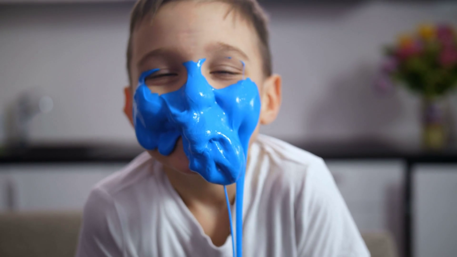 Joyful Child With Blue Handmade Slime Funny Stock Motion Graphics SBV ...