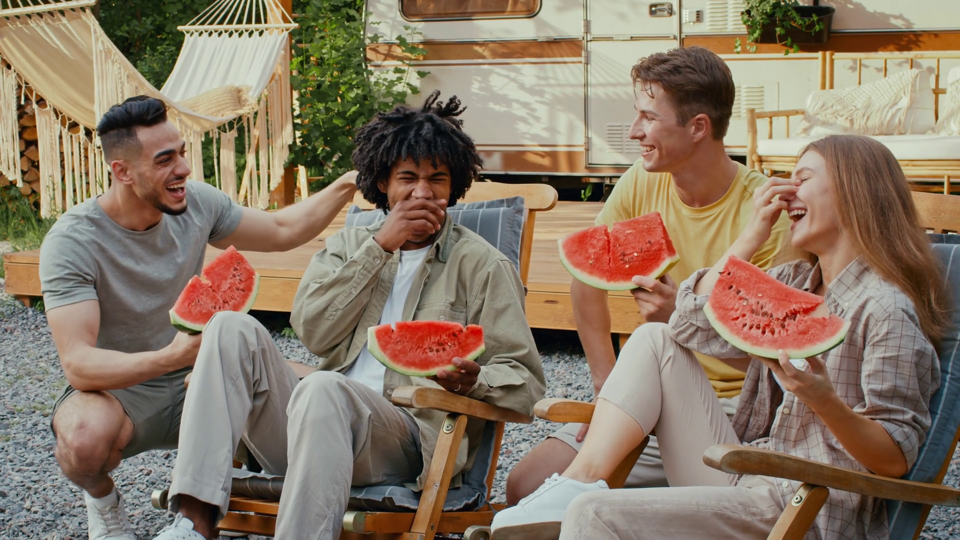 Four Diverse Friends Laugh Share Watermelon Stock Footage SBV-352004601 ...