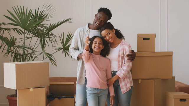 Excited Family Shows Keys To New Home Stock Footage: Royalty-Free Video ...