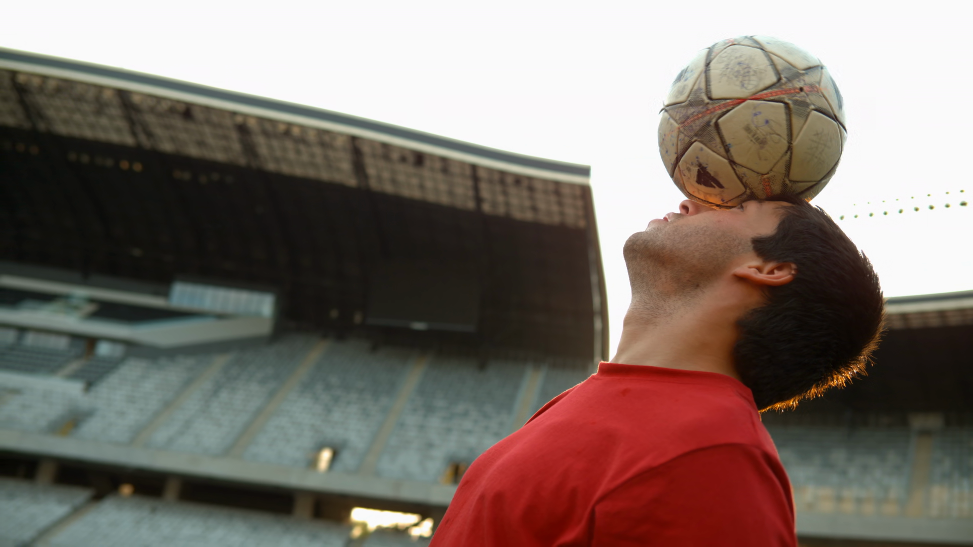 Football Player Holding Ball On Forehead Stock Footage SBV-354316586 ...