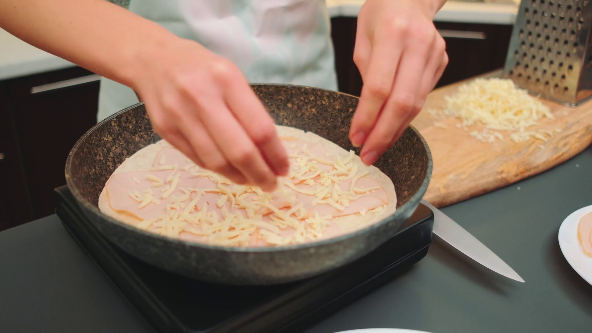 Woman Adding Grated Cheese To Pan On Top Of Stock Footage SBV-348584929 ...