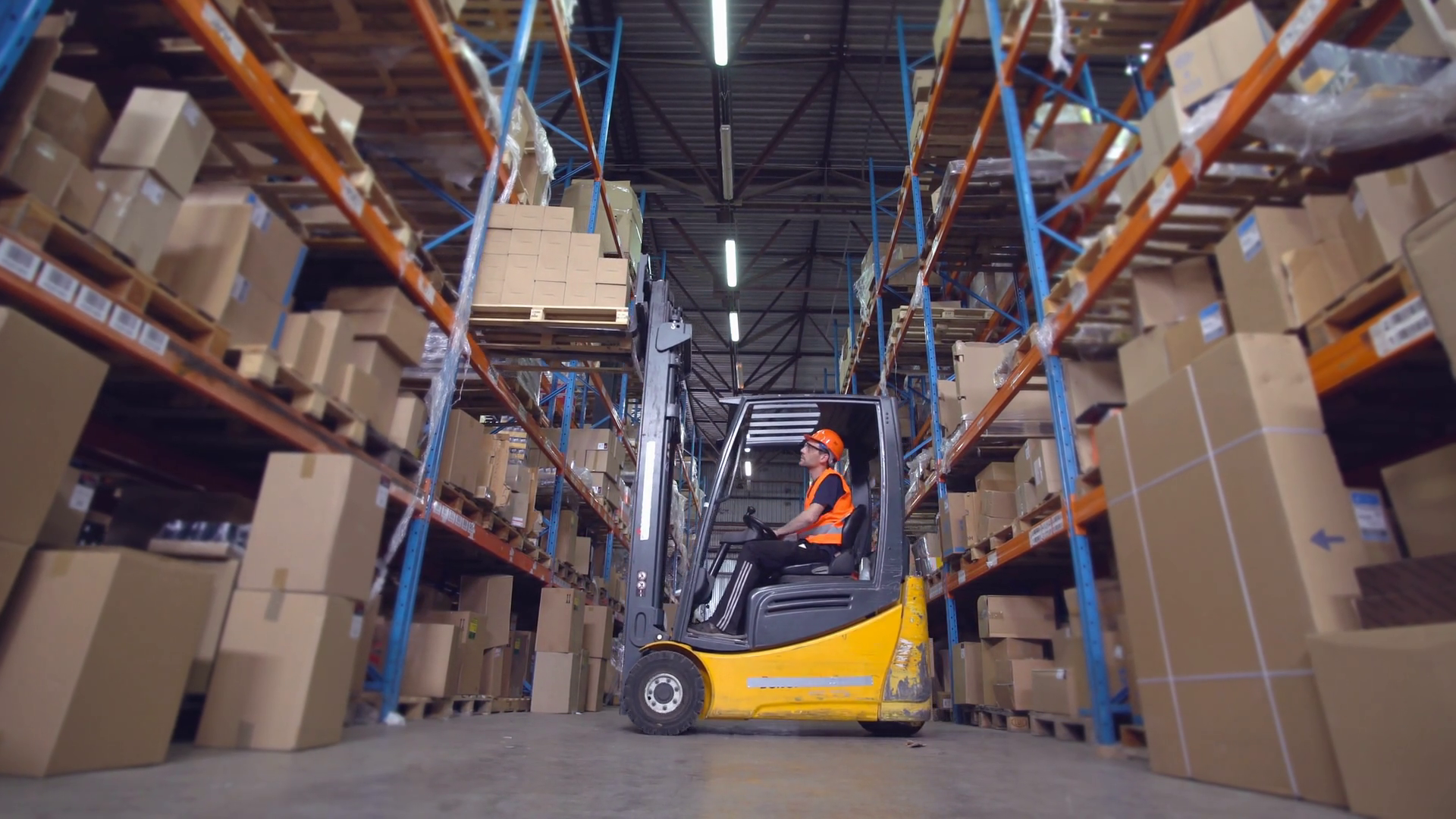 Worker In Warehouse Riding On Forklift Stock Footage SBV-316451680 ...