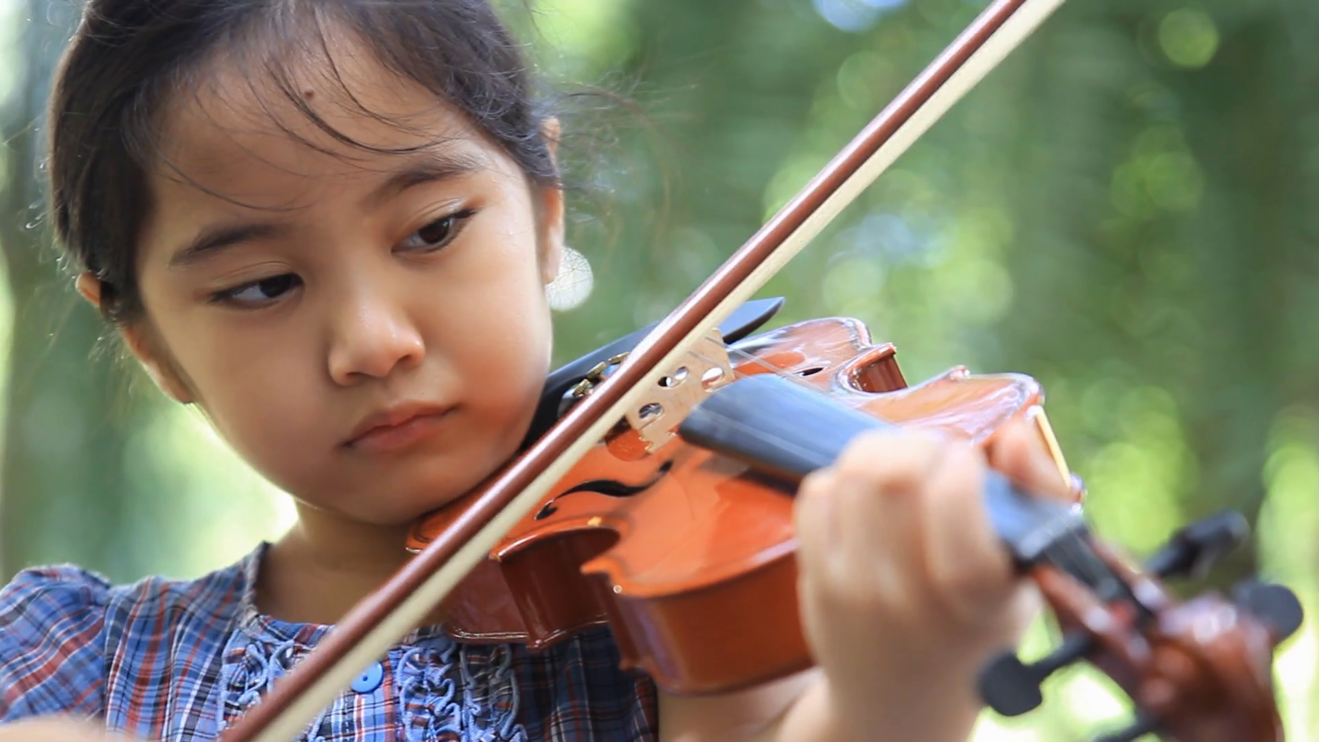 Young Girl Playing Violin In Park Pan Shot Stock Footage SBV-301719421 ...