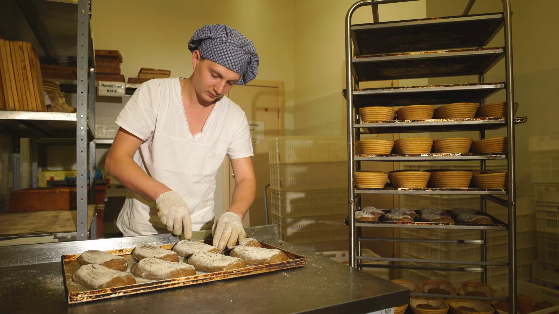 A Baker Makes Manual Incisions On Dough Stock Footage SBV-313827018 ...