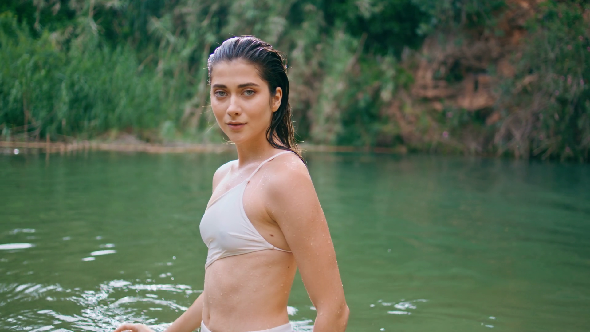 Wet Lady Emerging From Pond Looking Camera Stock Footage SBV-348686923 ...