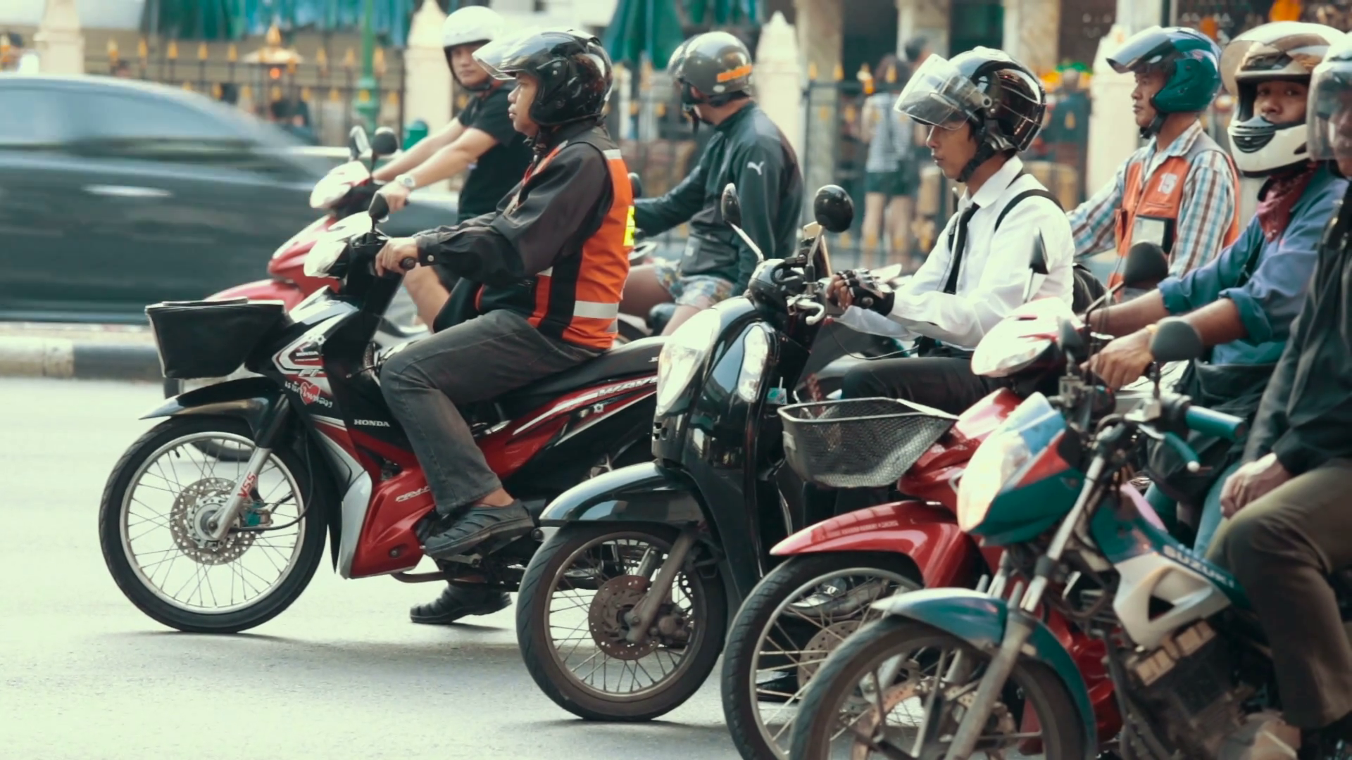 Thailand Bangkok November 20 Street traffic, people on mopeds and  motorcycles on the streets of the city