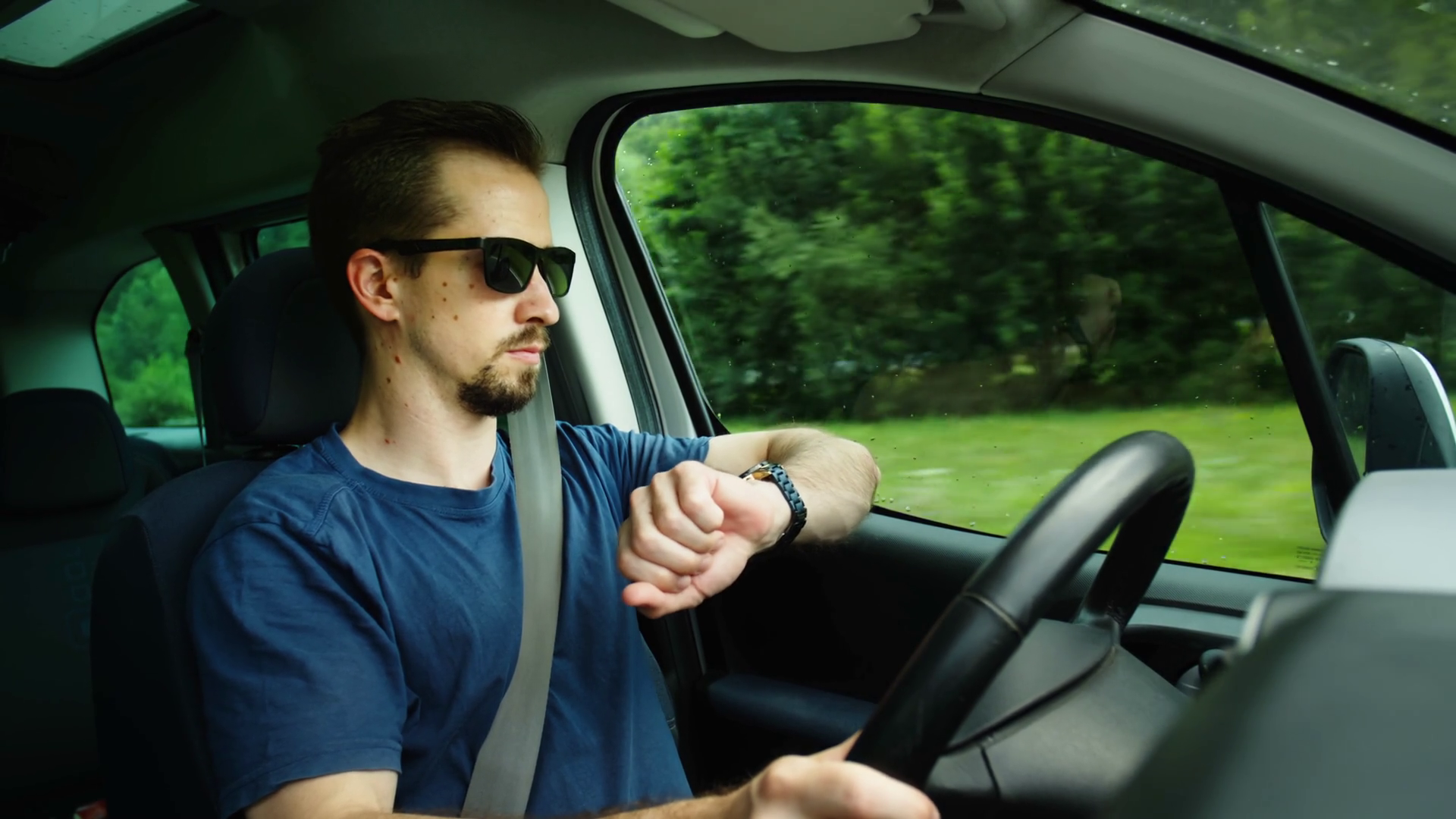 Male Car Driver With Sunglasses Check Time Stock Footage SBV-349114705 ...