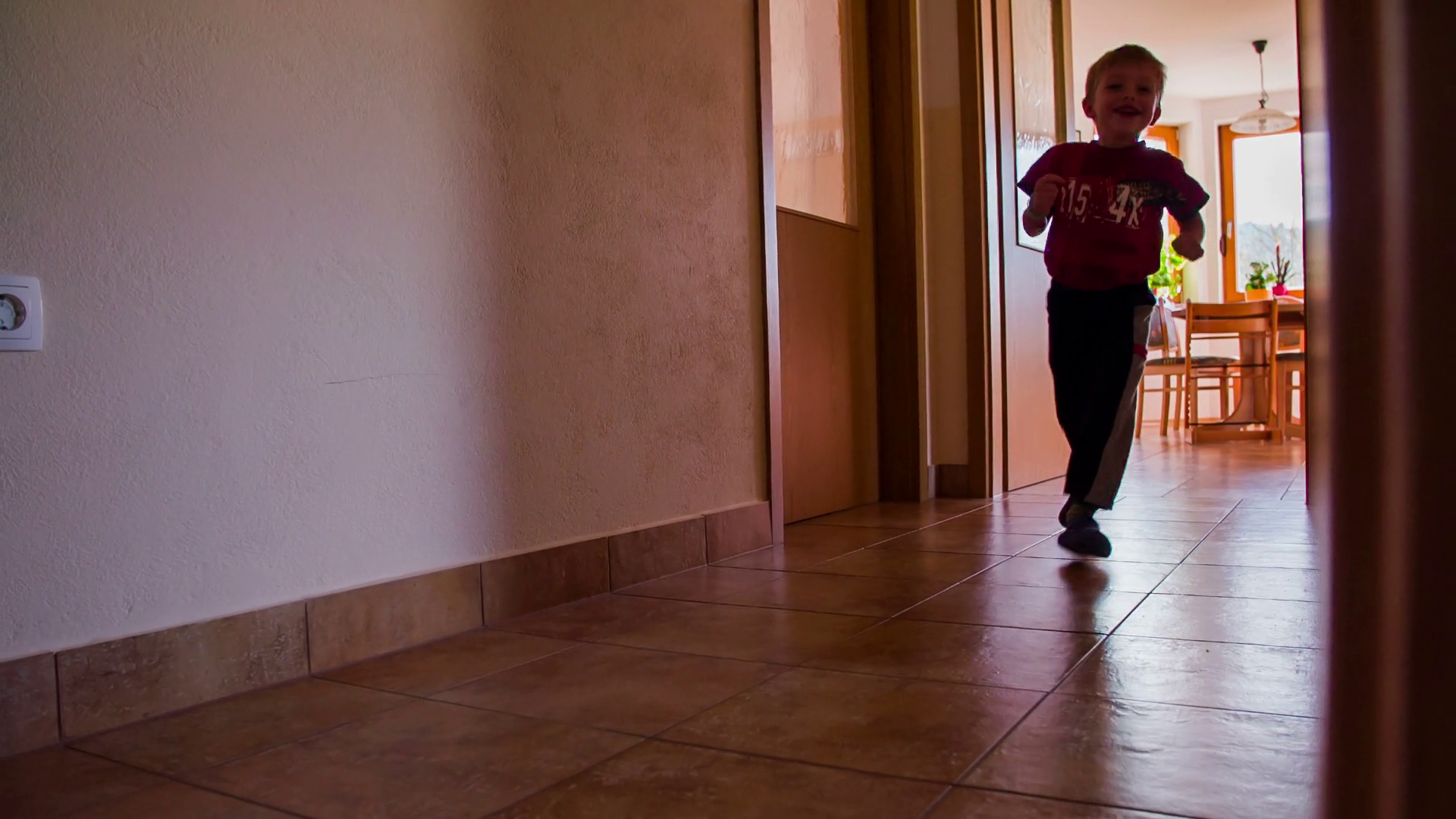 Energetic Young Boy Running Around House In Stock Footage SBV-316043737 ...