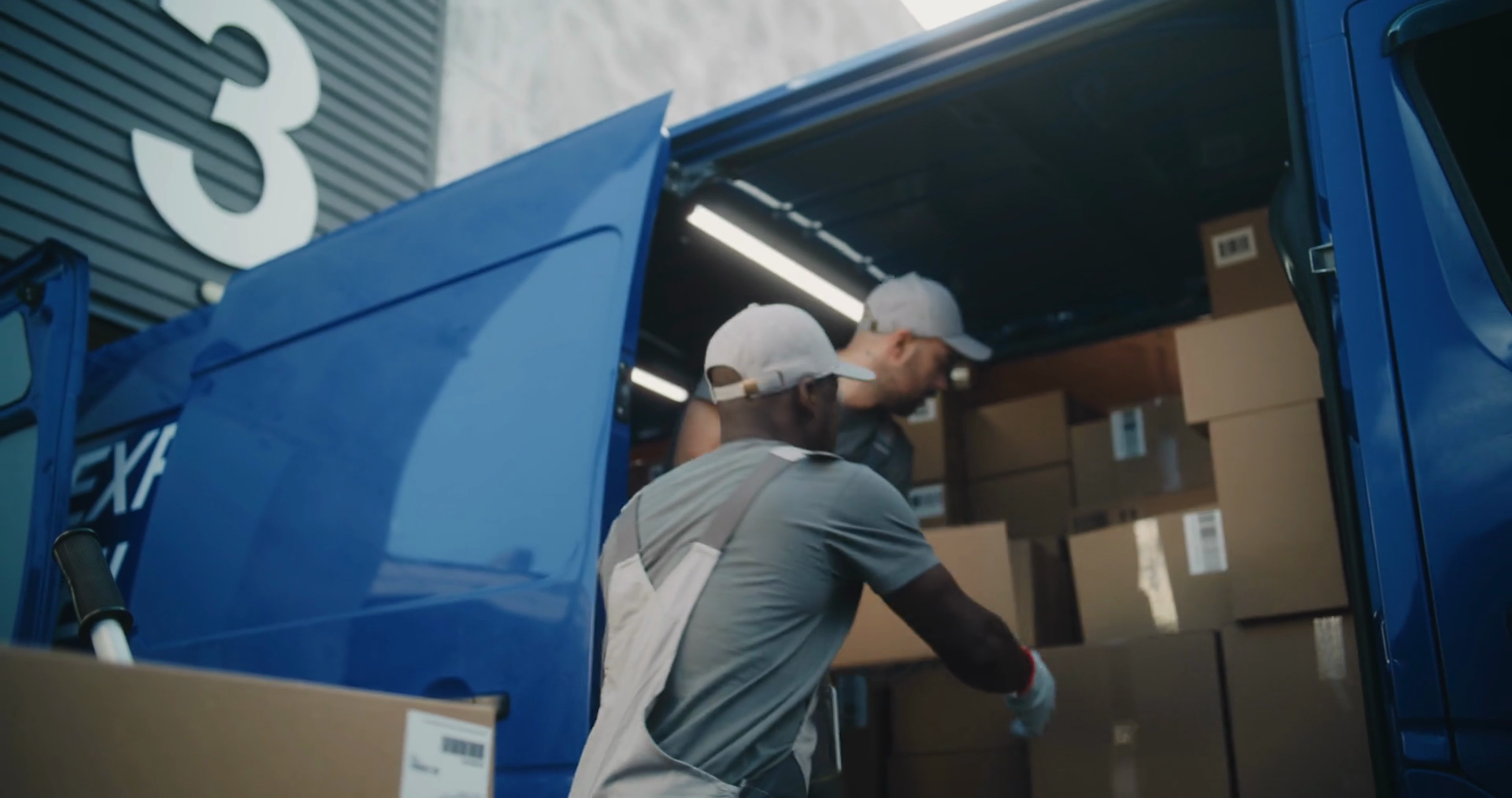Team Of Two Multiethnic Workers Loading Stock Footage SBV-352385335 ...
