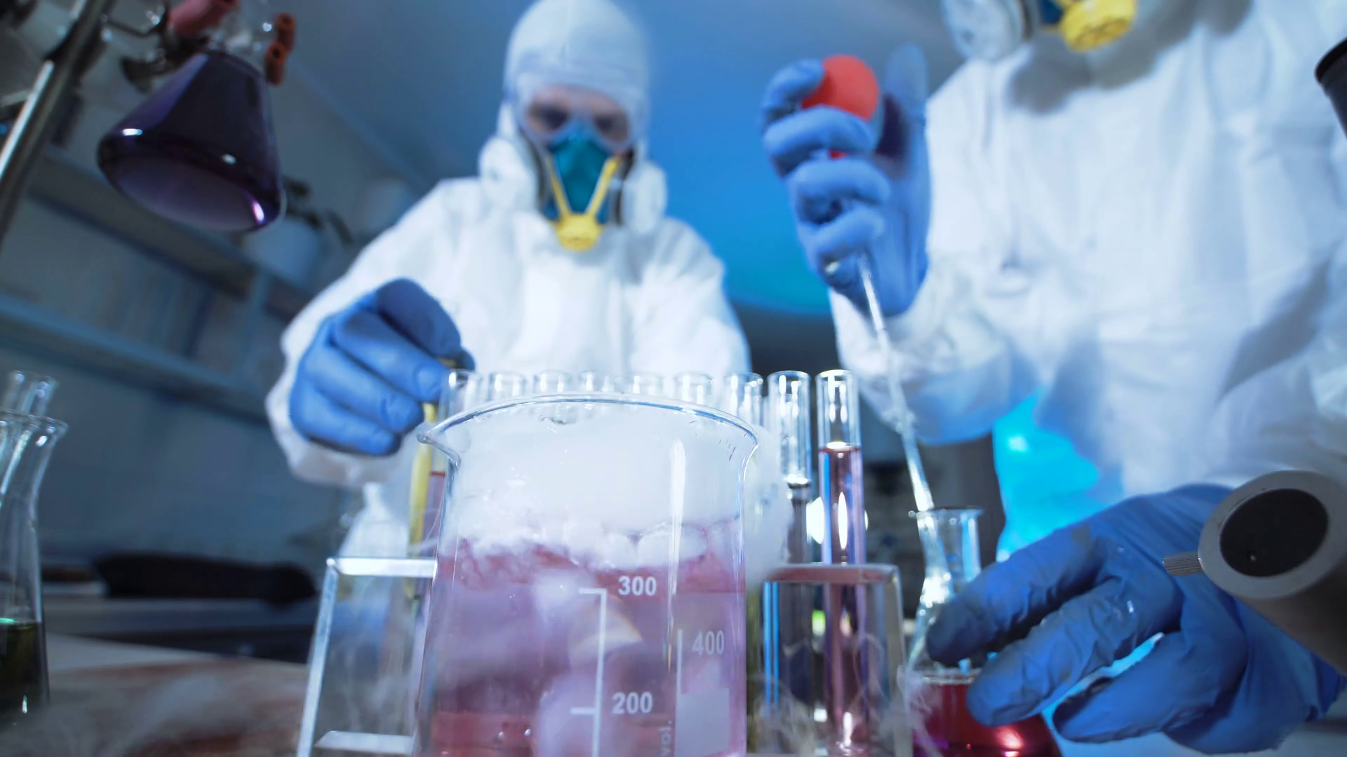 Two Scientists In Full Biohazard Masks With Stock Footage SBV-315901719 ...