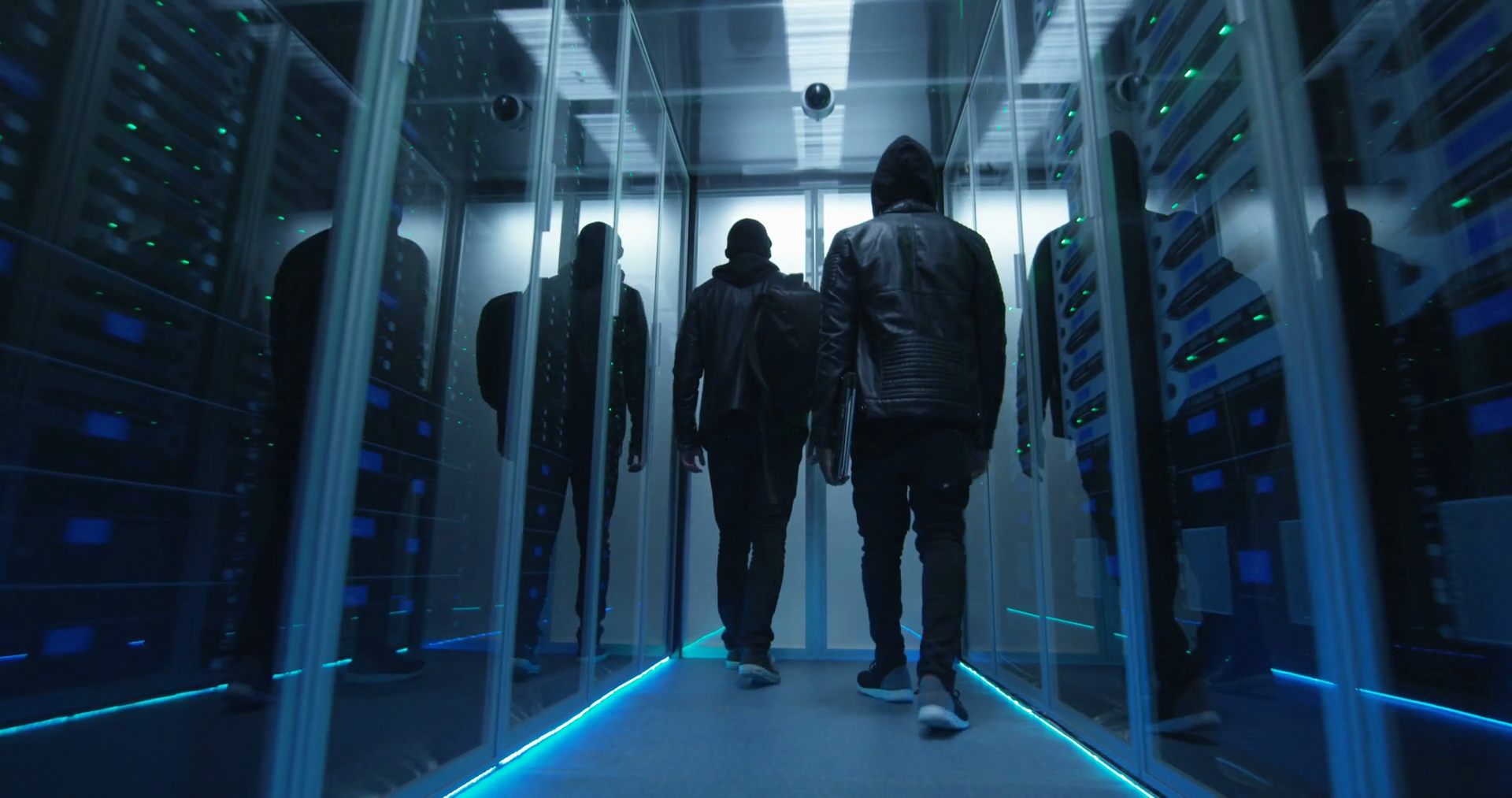 Wide Shot From Behind Of Two Hackers Walking Stock Footage SBV ...