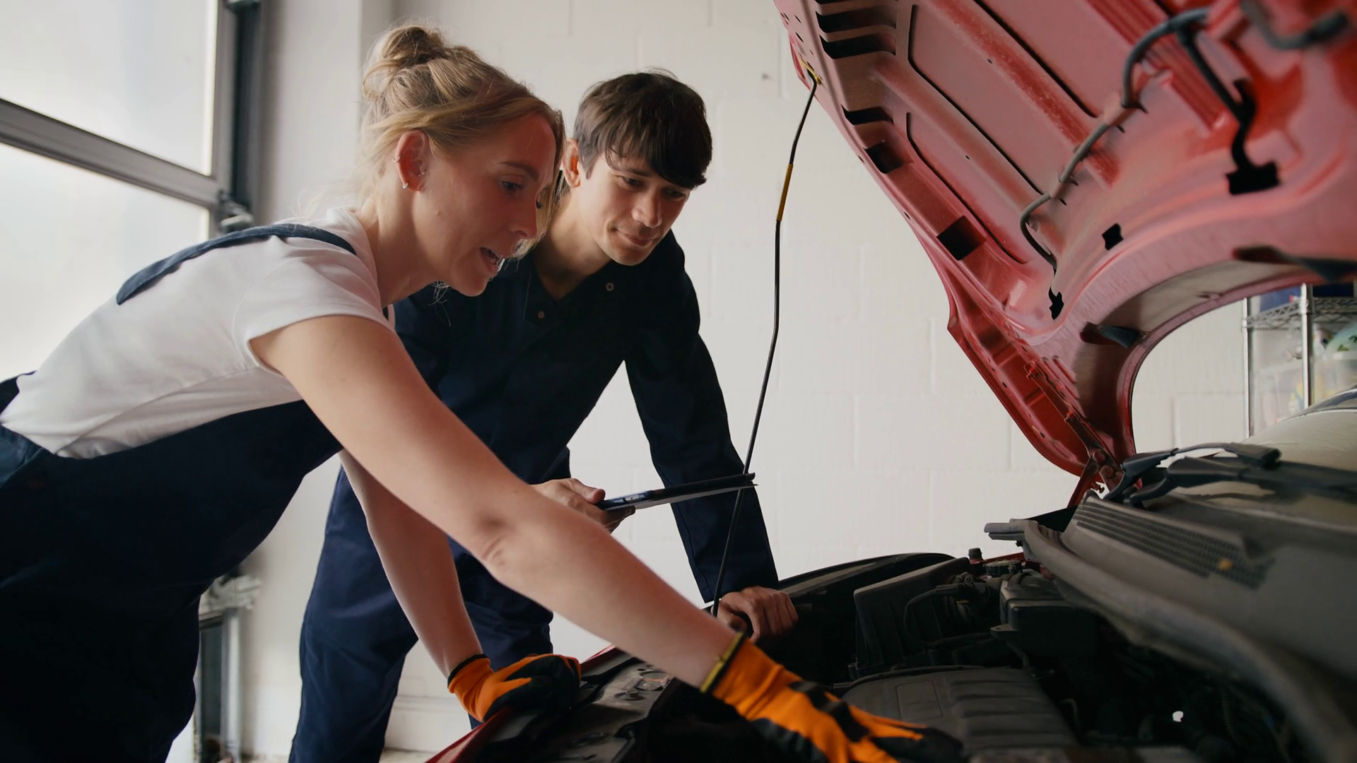Female Car Auto Mechanic With Trainee Stock Footage SBV-349058698 ...