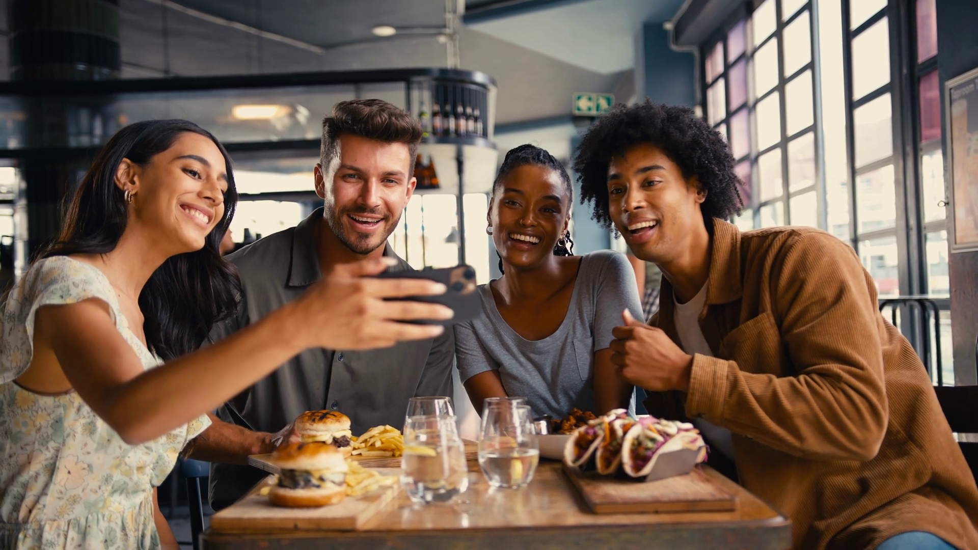 Group Of Friends Meeting Up In Restaurant Stock Footage SBV-347744424 ...