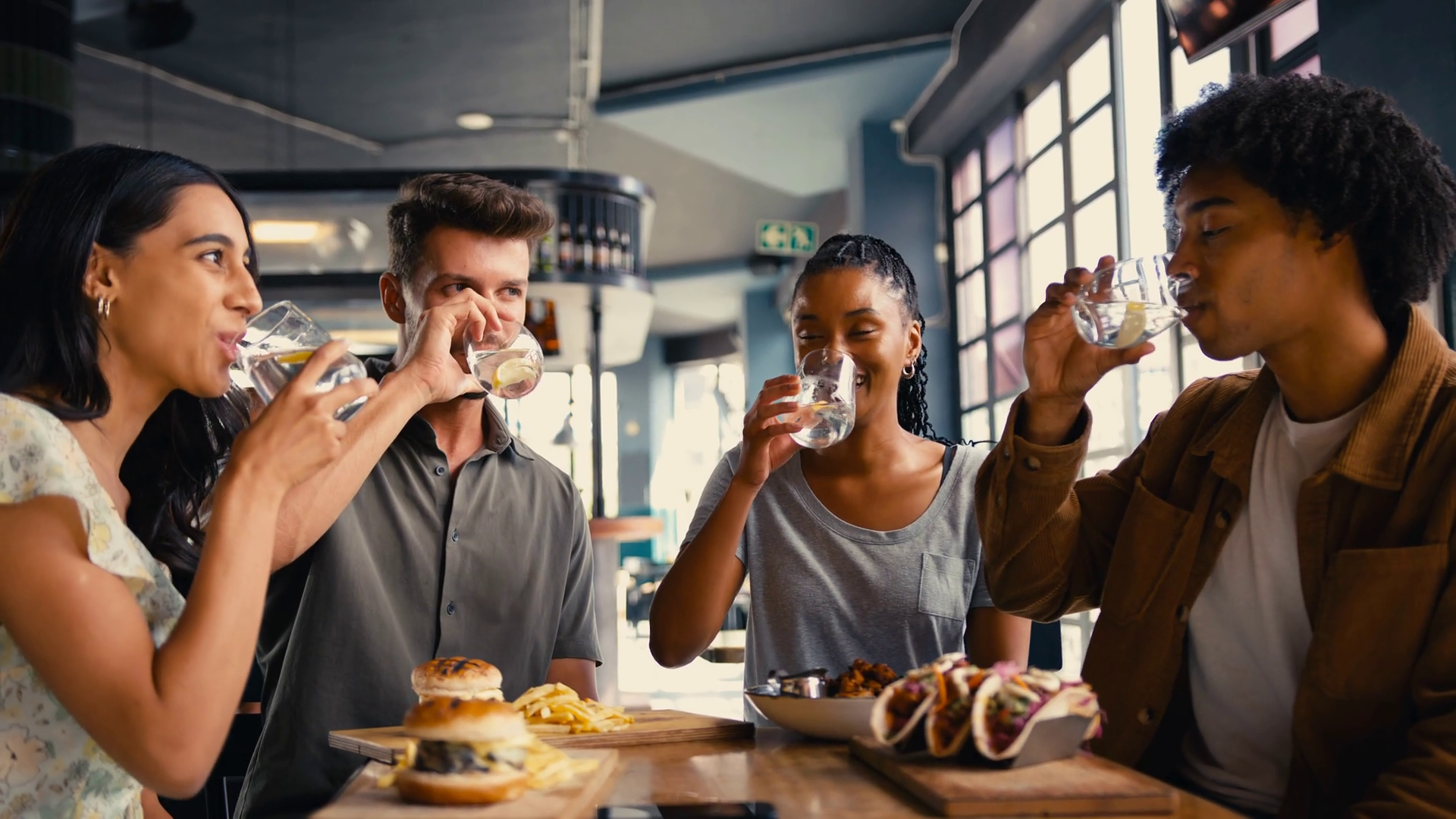 Group Of Friends Meeting Up In Restaurant Stock Footage SBV-347744616 ...