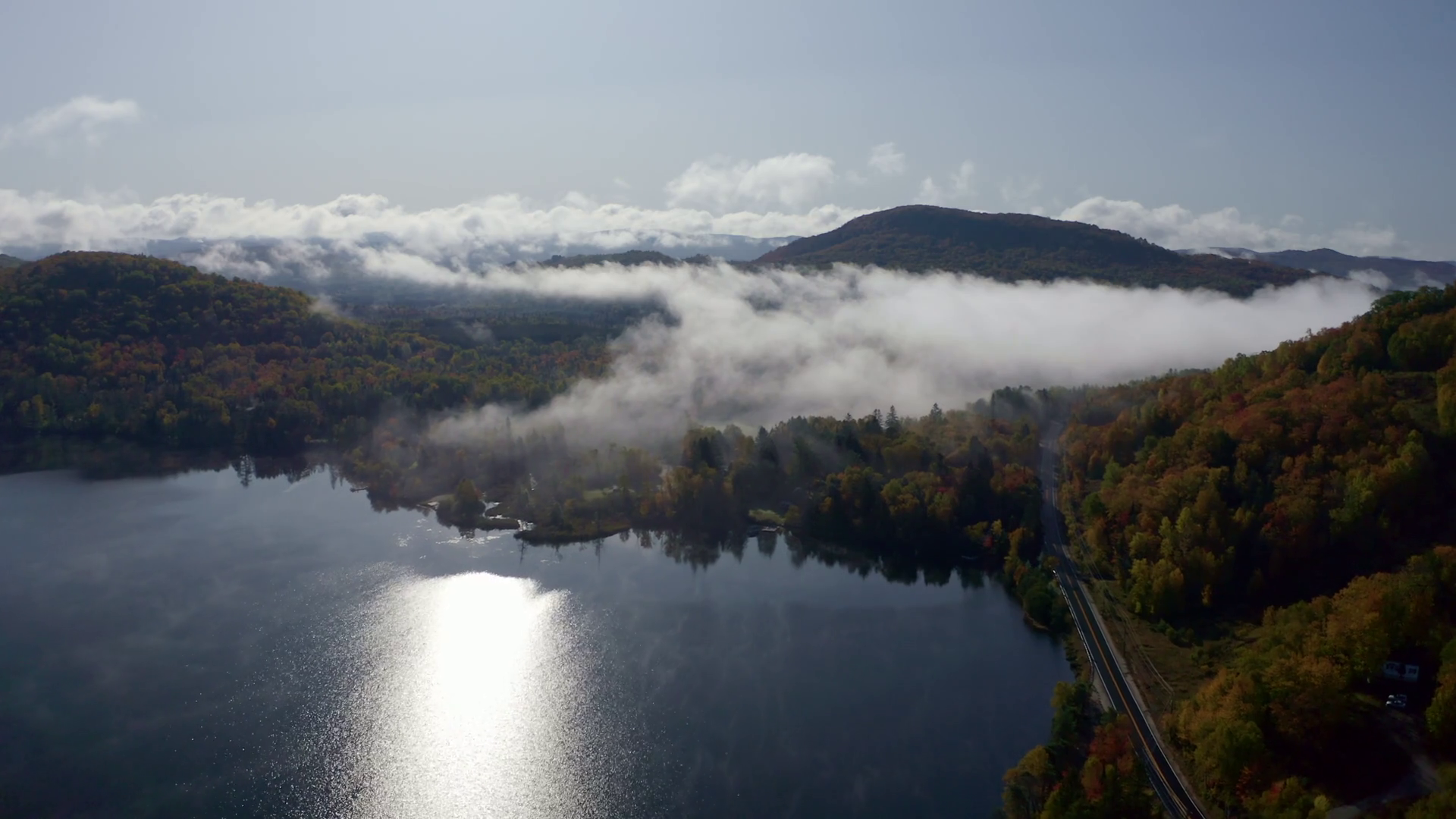 Aerial View Of Misty Lake Forested Hills Stock Footage SBV-351437622 ...