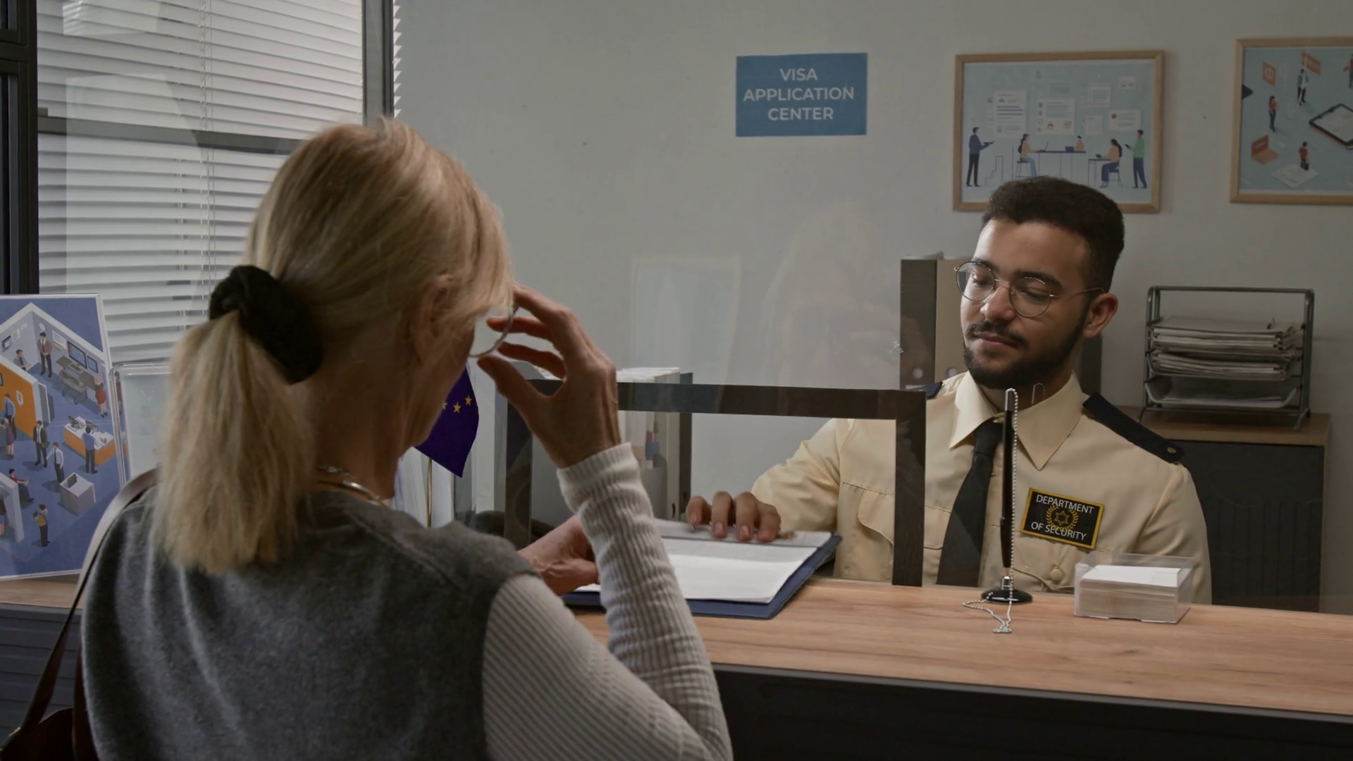 Young Male Visa Processing Officer Taking Stock Footage SBV-352293657 ...