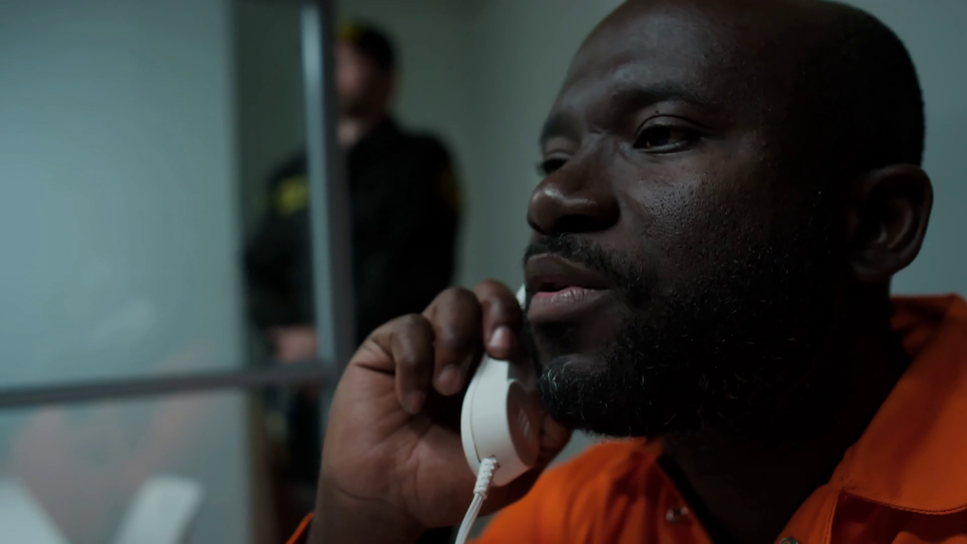 African American Inmate Talking On Phone In Stock Footage SBV-348820222 ...