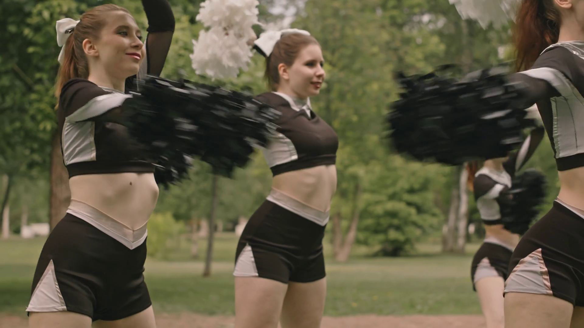 Cheerleading Squad In Uniform Dancing With Stock Footage SBV-348445163 ...