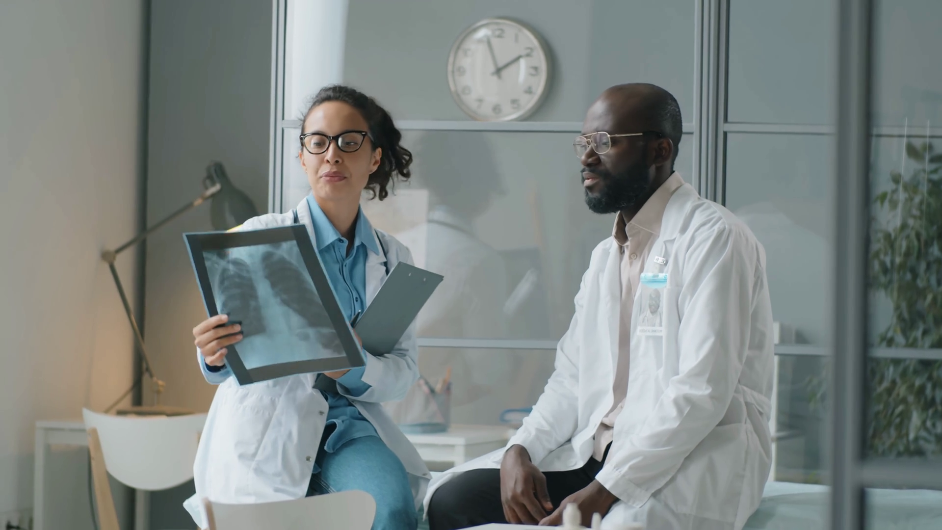 Mixed Race Female Doctor Discussing Chest Stock Footage SBV-347698509 ...