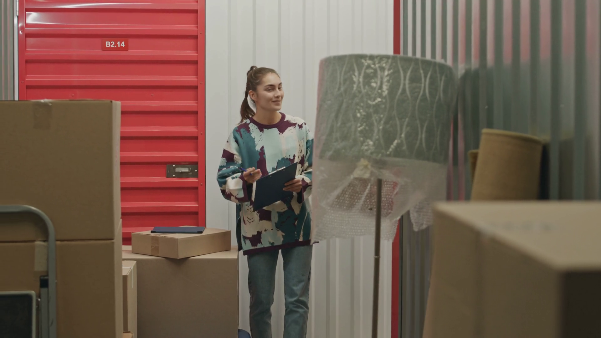 View From Self Storage Unit Of Female Worker Stock Footage SBV ...