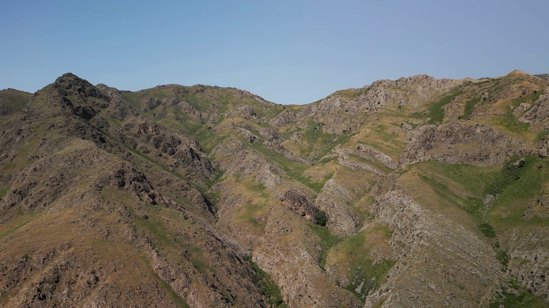 Aerial View Moves Over Sharp Ridges Deep Stock Footage SBV-352626491 ...