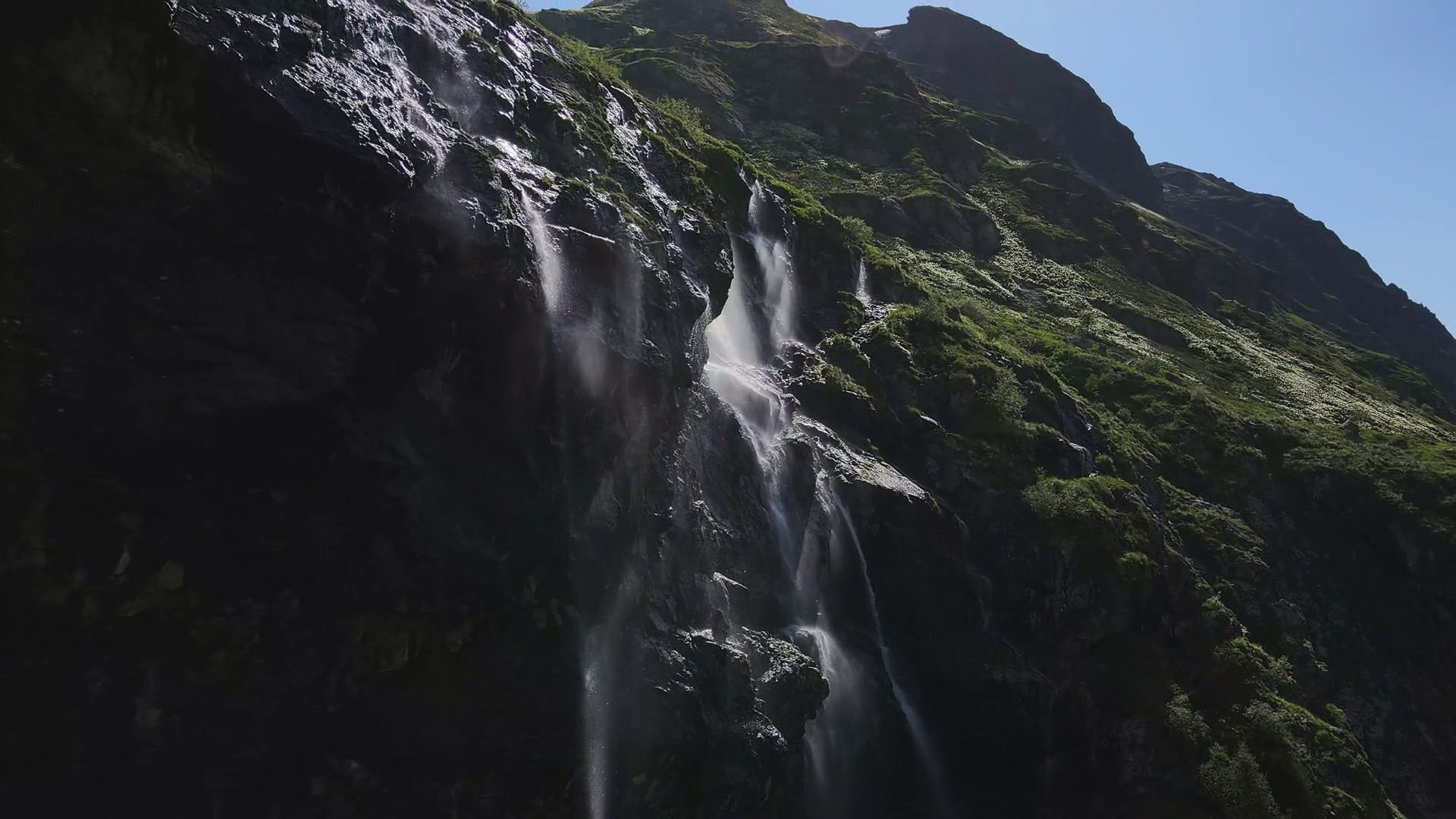 Water Flows Down Slope Of Mountain Covered Stock Footage SBV-348988087 ...